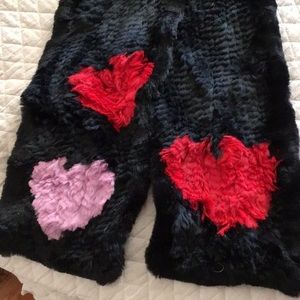 Gorgeous fur scarf with red and pink hearts at ends. 65” in length.